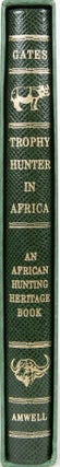 Item #6127 Trophy Hunter in Africa. Elgin T. Gates